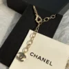 Chanel black and white four-leaf clover enamel necklace