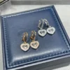 Chopard paved heart earrings