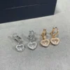 Chopard paved heart earrings