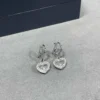 Chopard paved heart earrings