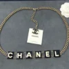 Chanel 2022 Black & White Enamel Gold Plated Logo Belt