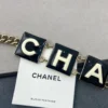 Chanel 2022 Black & White Enamel Gold Plated Logo Belt