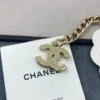 Chanel 2022 Black & White Enamel Gold Plated Logo Belt
