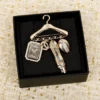 Chanel hanger shape brooch
