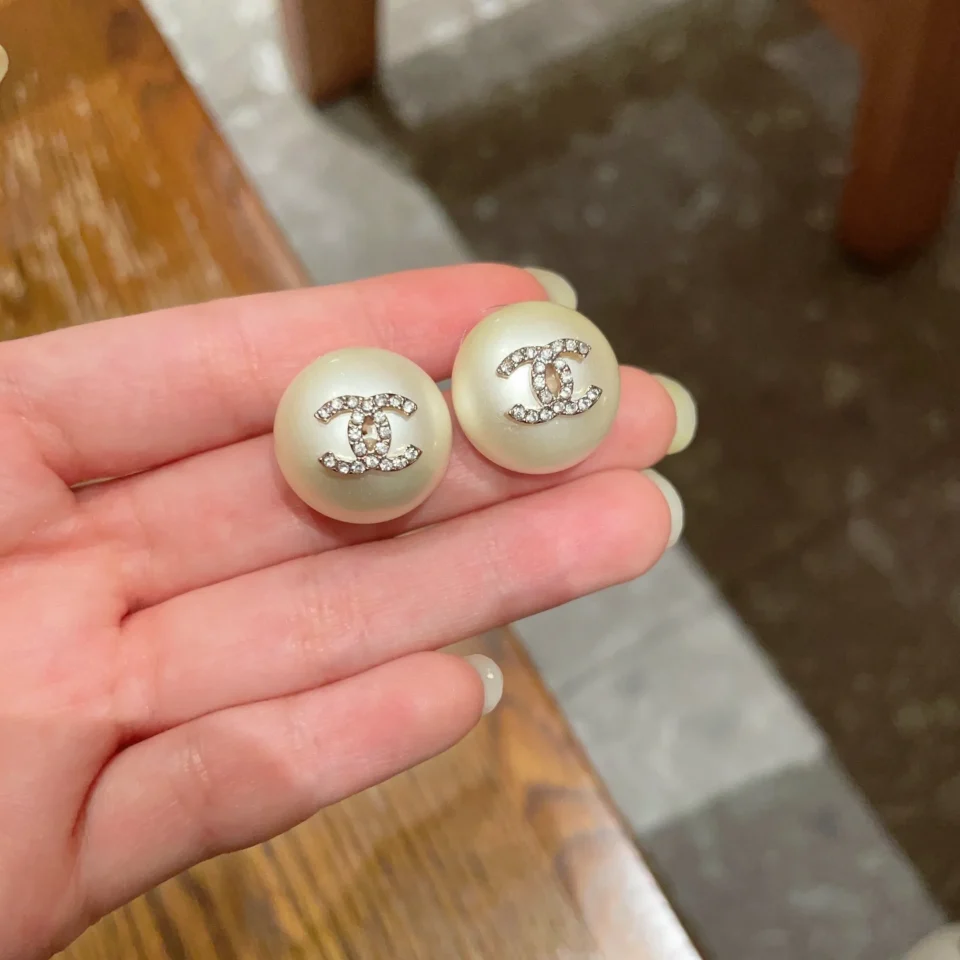 Chanel pearl button stud earrings , White