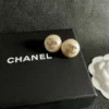 Chanel pearl button stud earrings , White