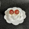 Chanel resin button stud earrings , black ,red