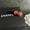 Chanel resin button stud earrings , black ,red