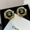 Chanel camellia button stud earrings , Black & Golden