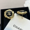 Chanel camellia button stud earrings , Black & Golden