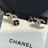 Chanel camellia stud earrings , Black