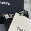 Chanel camellia stud earrings , White & Black