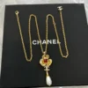 Chanel Camélia pearl pedant necklace