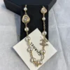 Chanel Brushed Threaded Button Pearl Necklace