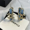 CHANEL Hoop earrings – Metal & denim, gold & blue