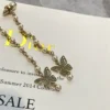 DiorWomen Métamorphose Earrings Gold-Finish Metal and White Resin Pearls