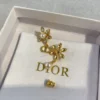 Dior Bloom in  Earrings Gold-Finish Metal with White Resin Pearls and Silver-Tone Crystals