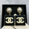 CHANEL Metal Resin Pearl CC Drop Earrings Gold Black White