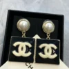 CHANEL Metal Resin Pearl CC Drop Earrings Gold Black White