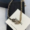 Chanel 2023 Srass & Leather CC Choker – Black, Gold