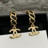 Chanel Hoop Earrings Gold Metal Black Leather