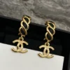 Chanel Hoop Earrings Gold Metal Black Leather