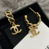 Chanel Hoop Earrings Gold Metal Black Leather