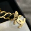 Chanel Hoop Earrings Gold Metal Black Leather