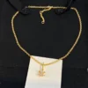 Triomphe Solitaire Sparkle Necklace in Strass and Brass with Gold Finish