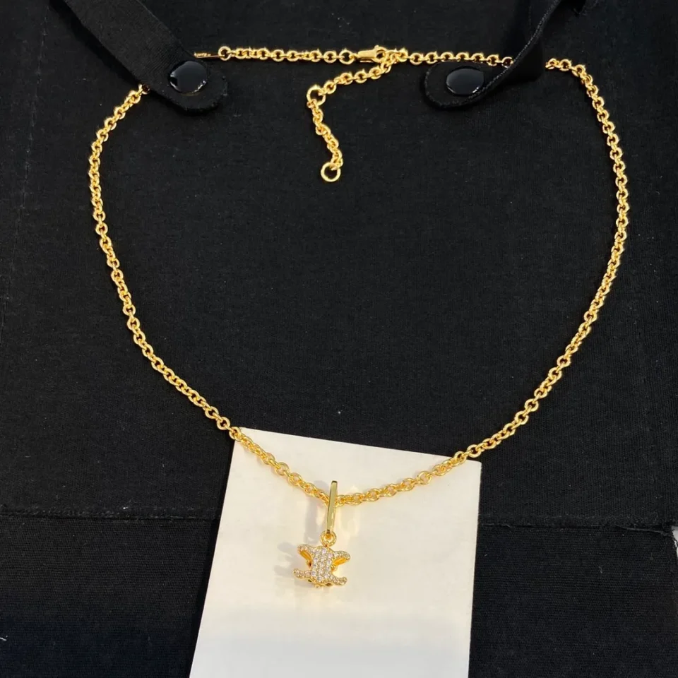 Triomphe Solitaire Sparkle Necklace in Strass and Brass with Gold Finish