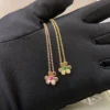Frivole pendant necklace, small model ,Pink diamonds,Green diamonds