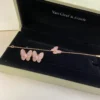 Two Butterfly earrings ,18K rose gold, Diamond, Mother-of-pearl