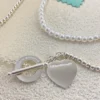 Wrap Necklace in Silver with Pearls and a Diamond, Small