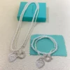 Wrap Necklace in Silver with Pearls and a Diamond, Small
