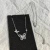 Double Butterfly Silhouette Diamond Pendant