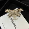 Chanel Brooch Coco Mark Ribbon Motif Golden Gold-plated