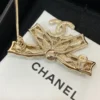 Chanel Brooch Coco Mark Ribbon Motif Golden Gold-plated