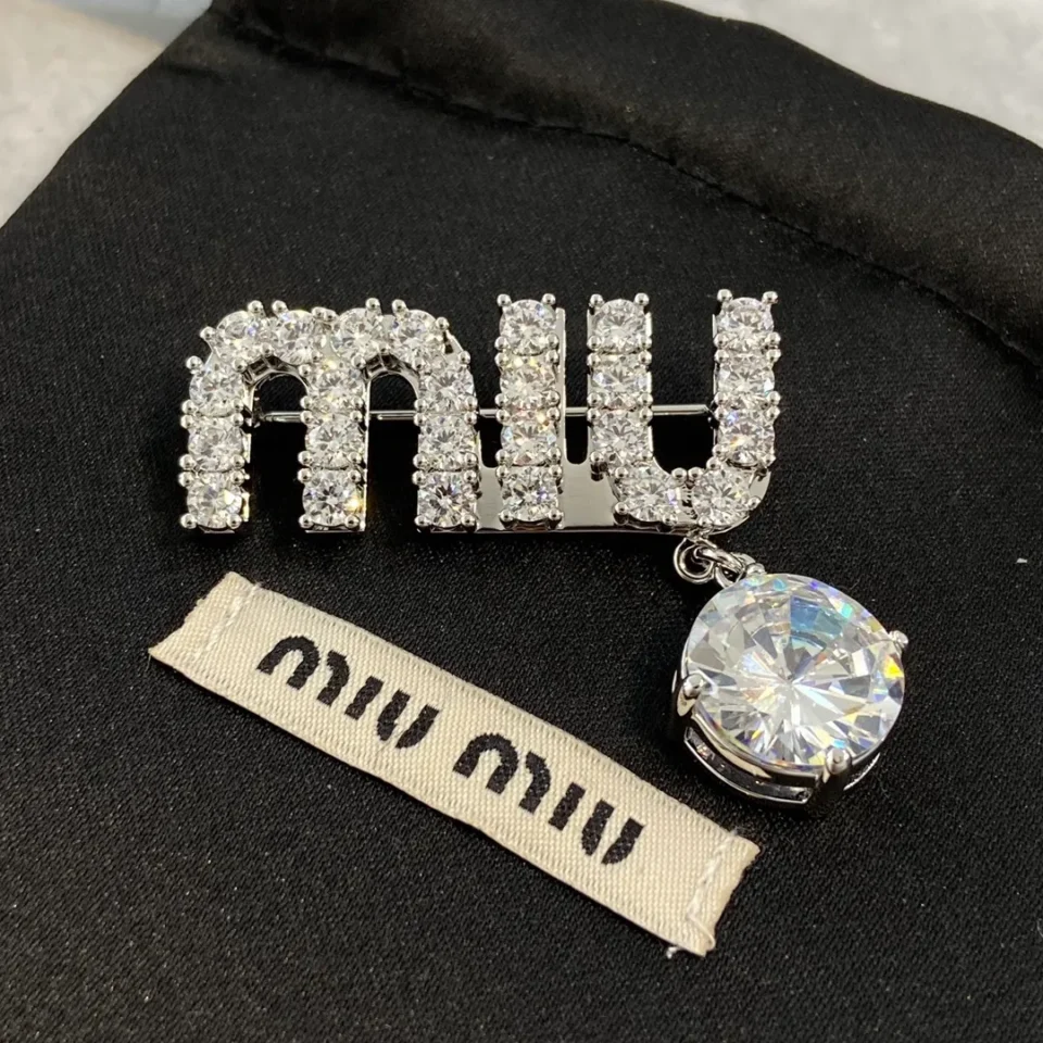 Crystal pin & brooche Miu Miu Silver in Crystal