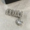 Crystal pin & brooche Miu Miu Silver in Crystal
