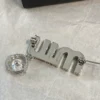 Crystal pin & brooche Miu Miu Silver in Crystal