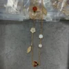 Lucky Spring long necklace, 15 motifs