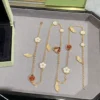 Lucky Spring long necklace, 15 motifs