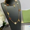 Lucky Spring long necklace, 15 motifs