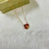 Lucky Spring pendant, open wings ladybug