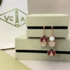 Lucky Spring Earrings, open wings ladybug