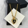 2024/25 Métiers d’art   Chanel Pedant necklace   Metal & Resin  Golden & Black