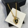 2024/25 Métiers d’art   Chanel Pedant necklace   Metal & Resin  Golden & Black