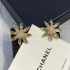 2024/25 Métiers d’art  Ear stud   Metal & Strass  Gold & Crystal