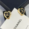 2024/25 Métiers d’art Heart  Ear stud   Metal & Strass  Gold &Black resin