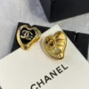 2024/25 Métiers d’art Heart  Ear stud   Metal & Strass  Gold &Black resin